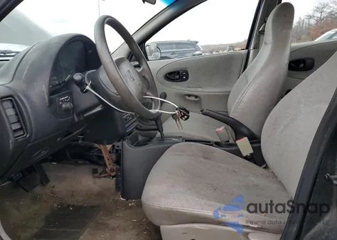 1999 Saturn Sl1 from USA, damaged, VIN 1G8ZH5284XZ187243